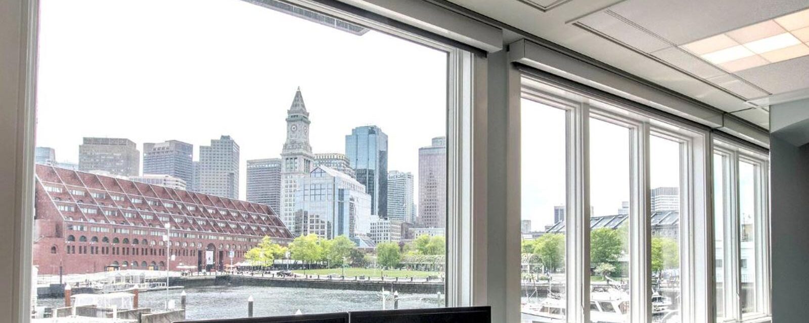 A photo of a window in BLS's office, showing the harbor view